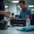 An experienced technician refilling a monochrome laser printer cartridge with toner at a well-organized office station, using tools like a funnel and toner bottle.
